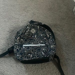 a black designed back pack